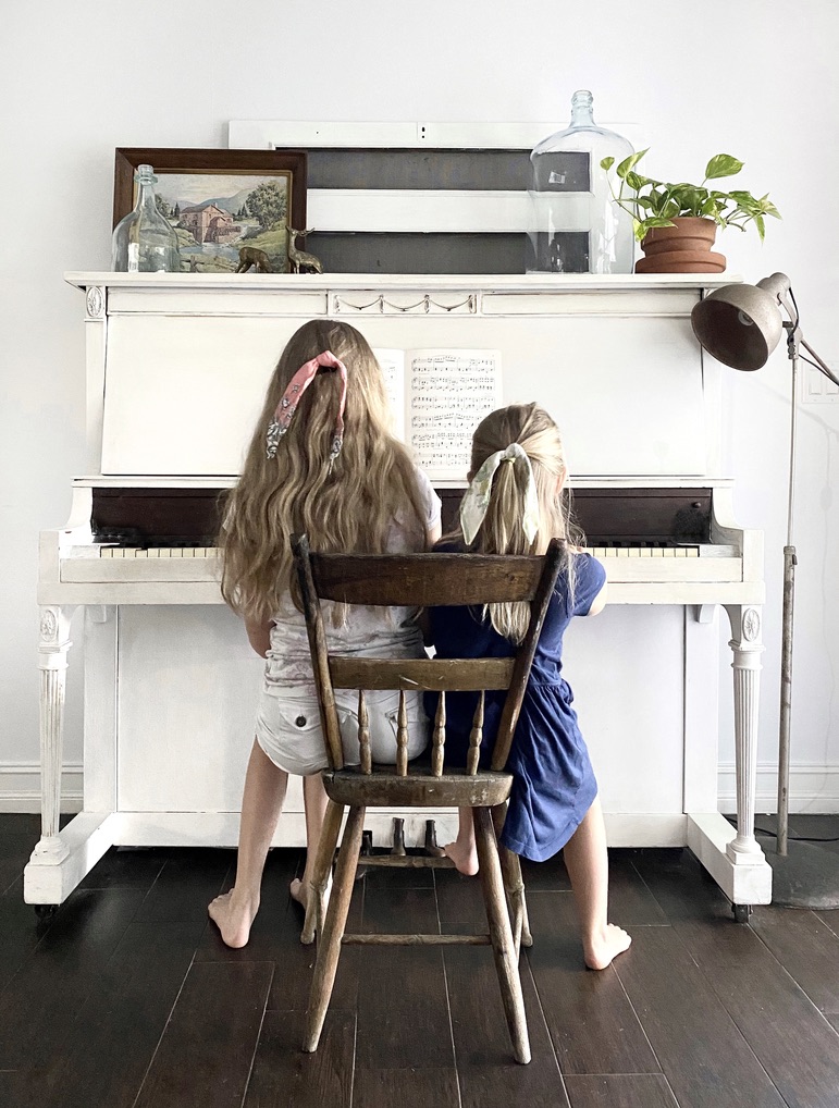 Capturing memories of our two girls playing piano styled with vintage summer inspired decor 