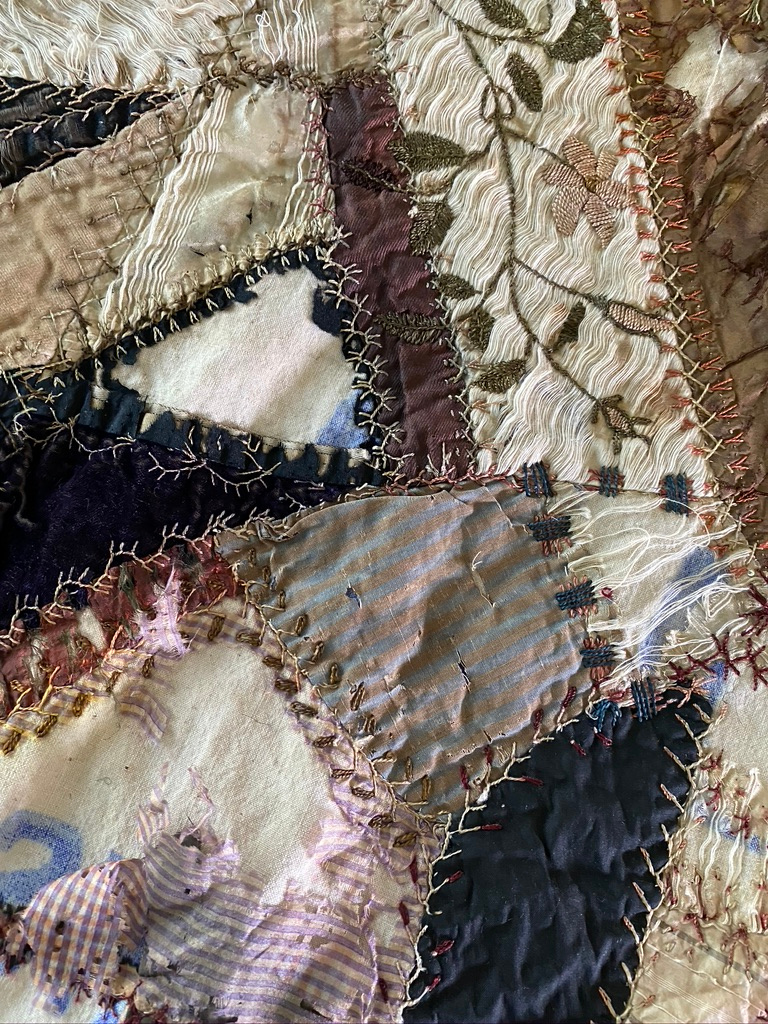 turn of the century crazy quilt close up photo